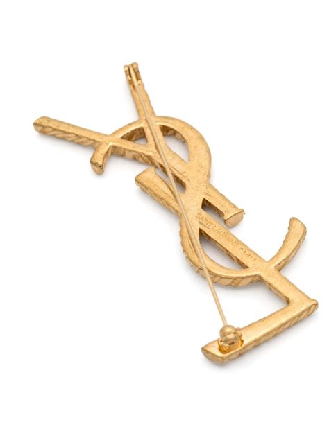 Saint Laurent Cassandre YSL Brooch .